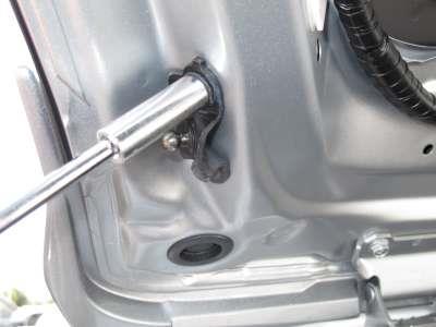 14. Using a 12mm Socket wrench, remove bolts holding upper(liftgate side) Ball mount bracket.