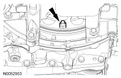 Remove and discard the 4 bolts (3 shown) and support the driveshaft with a length of mechanic's wire.