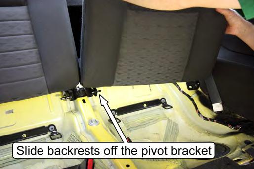 slide the backrests off of the center pivot bracket to