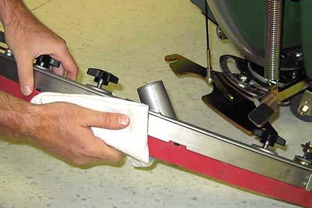 Wipe the squeegee blades clean (Figure 44).