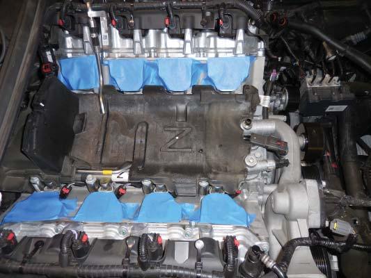 33. Apply blue tape over the ports to prevent anything from entering the engine.