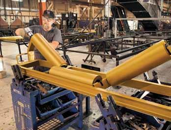 Cat steel rolls going through an automated five-stage assembly and testing process.