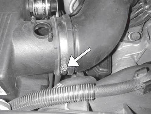 Remove the air box mounting tray by removing the five bolts.