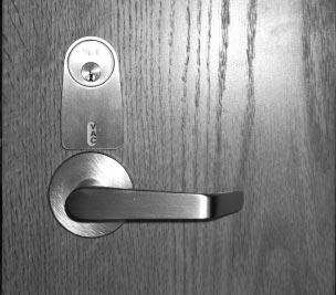 When specifying option IND, the lockset will be provided with an indicator that shows the room is either occupied (OCC) when deadbolt is thrown or vacant (VAC) when deadbolt