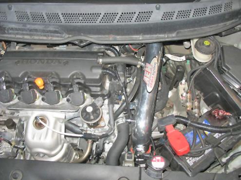Be sure that the pipes or any other components do not contact any part of the vehicle. Tighten the rubber mount, all bolts, and hose clamps. e. Check for proper hood clearance.