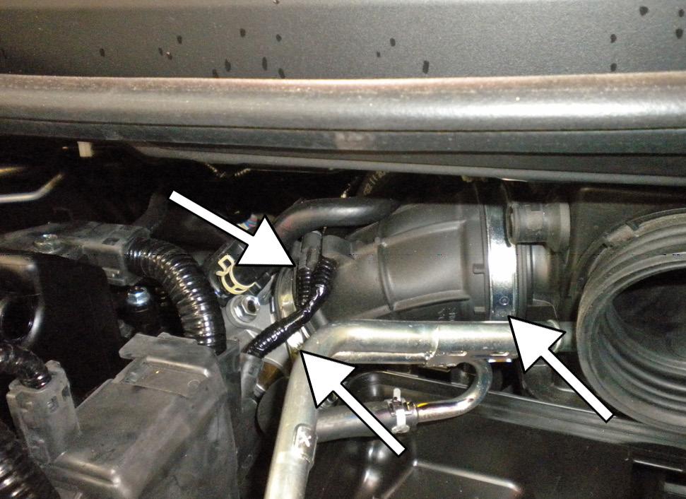 Disconnect the rubber inlet duct from the front of the air box, then remove the air box