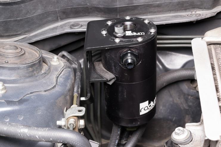 NOTE: The AOS-R coolant ports are interchangeable. 18. Once properly clocked, the AOS-R can be bolted to the bracket.
