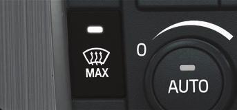 Press to activate the windscreen's electric heating* - symbol (1) in the screen illuminates.