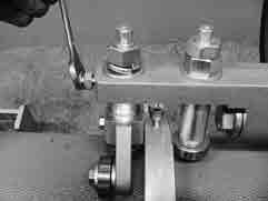 2 Tighten the adjusting bolt (M8) with spanner (13mm)