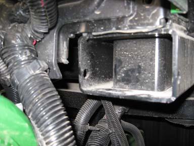 Mount the SA Module 3. Locate the existing hole at the bottom of the cab support shown in Figure 3-5.