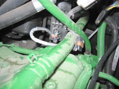 Disconnect the original vehicle s AutoTrac valve harness from the valve as shown in Figure 6-7.