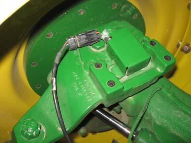 SA Module Harness 11. Reattach the Wheel Angle Sensor Cover to the axle.