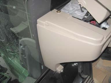 SA Module Harness 6. Lift the floor mat on the left side to gain access to the bottom bolt holding the bottom plastic molding the steering console.