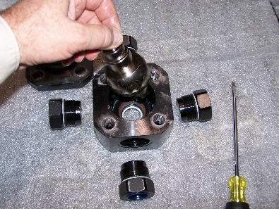 With the main fittings removed, the ball (trunion) itself can now be removed from the main ball valve body by pulling it up and out of the main valve body.