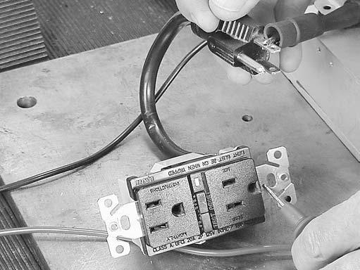 Meter should display battery voltage. Test POWERLINK Reset (ON-OFF) Switch multimeter, Tool #19464.