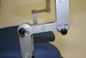 By pushing buttons the armrest can be adjusted to an optimal working position.