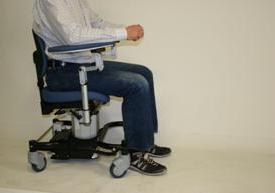 5. Move the chair against the operating table to achieve optimal access to the patient and foot pedals. 6.