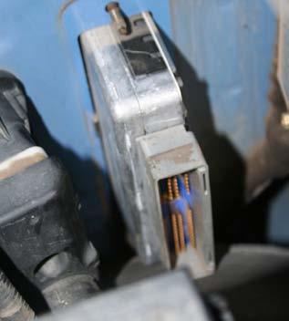 3. There is a 10mm bolt that needs to be removed from the back side of the ECU.