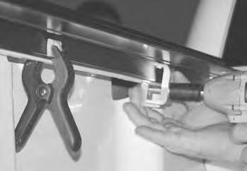 or ruler 2-9/16 wrenches Protective eyewear 1 - Spring clamp (to hold rails in place while clamping) optional NOTE ON BED LINERS: With an under-the-rail drop in bed liner, installation is possible
