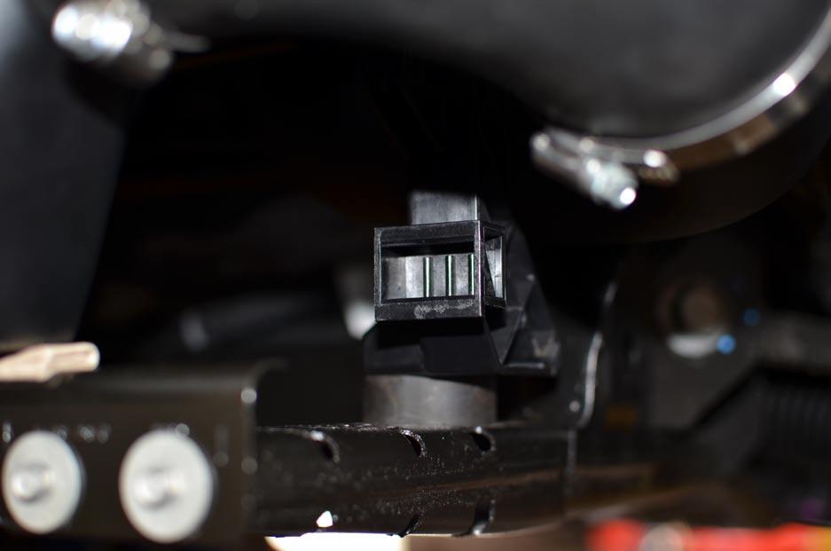 To brace the drivers side of the block-off panel, you will need to drill a mounting hole into the OEM cooler mount. (See Fig. 4-b) C.