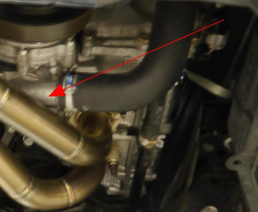 3. Thermostat fitting With the under-shields removed the thermostat is accessed from under the engine you remove this housing Figure 10 - Thermostat housing All bolts are accessible even with the
