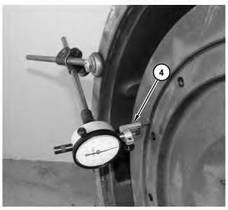 1. Refer to Illustration 1 and install the dial indicator. Always put a force on the crankshaft in the same direction before the dial indicator is read.