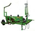 Such solution allows operation in the same direction as with a baler (along the field).
