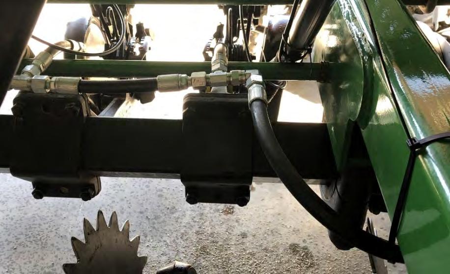 4) On the front rank, header hoses will typically be slightly longer (~2") than distance between cylinders (see Photo C), and where openers are somewhat close together, use the length specified and