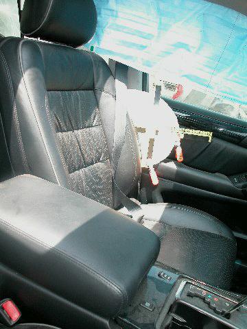 OCCUPANT KINEMATICS - 2002 Lexus GS300 The 31-year-old male driver (173 cm/68 in, 70 kg/155 lbs) of the Lexus GS300 was seated in a normal, upright position on a leather covered bucket seat.
