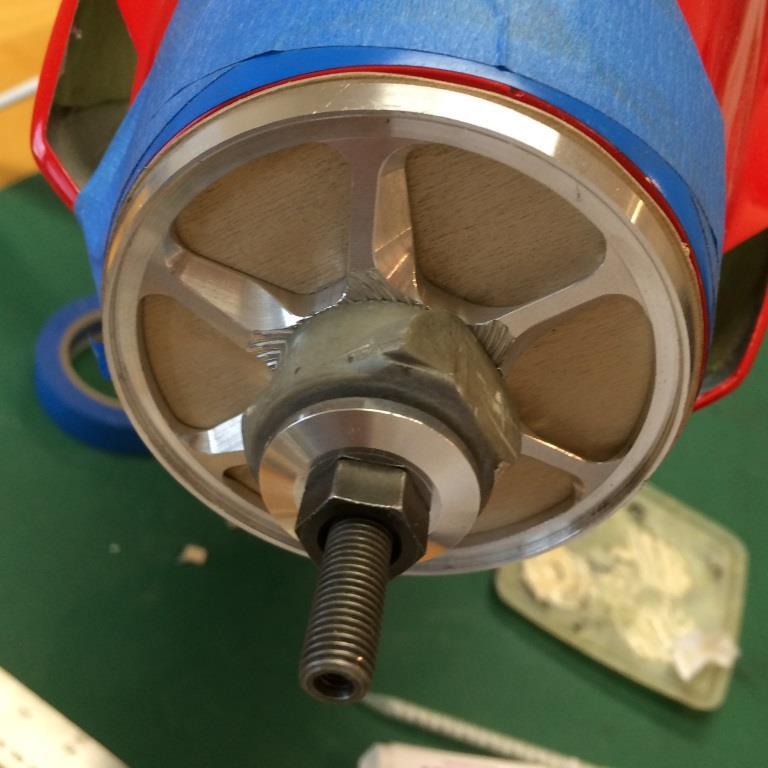 One mounting screw hole is drilled and the motor affixed to the plate.