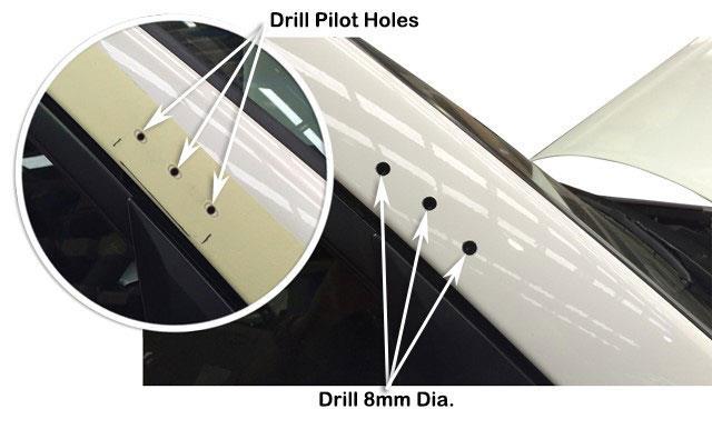 10 Drill a pilot hole for each of the three marked hole positions in the centre of each marked