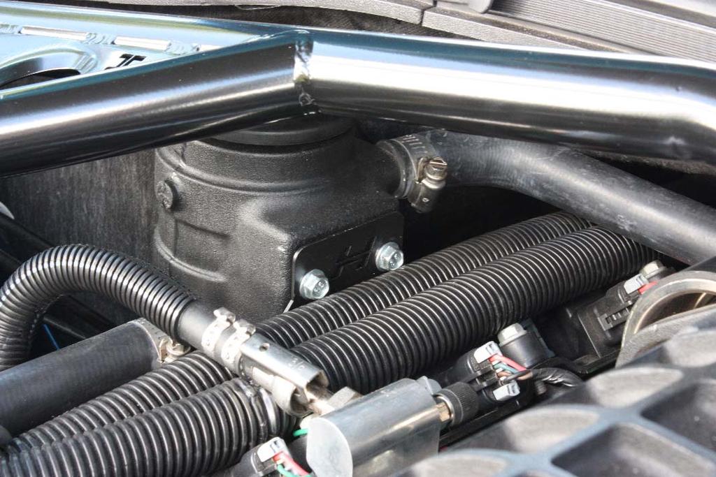 Supercharger Note: If you have the Magnuson supercharger (Magna Charger) installed on your vehicle, you will need to relocate the intercooler reservoir tank using the included Hotchkis bracket.