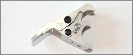 Only by fully closing the clamp lever (Fig.