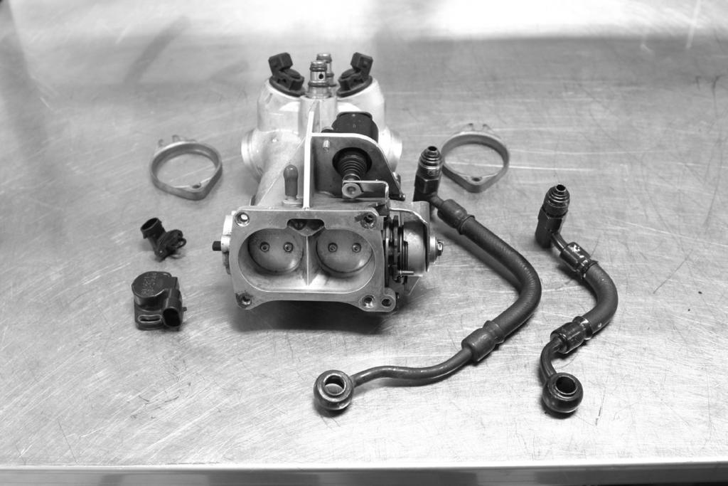 . 3- Verify the new manifold size is appropriate for your motorcycle by sliding it in place as