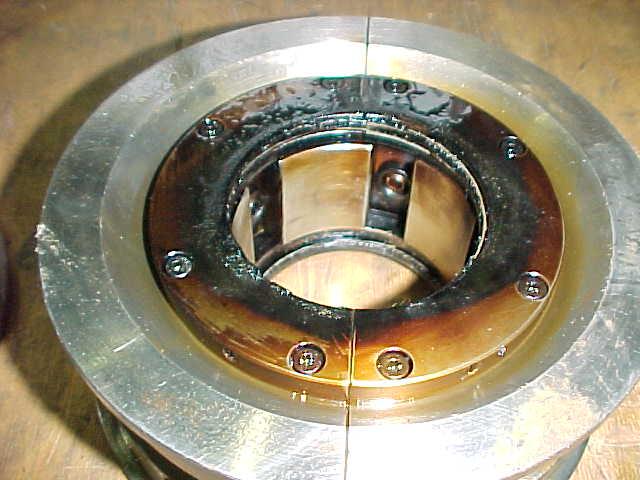 steel of the bearing surface. The metal body of the bearing goes through deformation and gets twisted i.e. the outer diameter is still within the dimensional tolerances, but it will fail its geometrical tolerances.