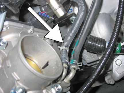 j. NOTE: Ensure the engine is completely cool before removing the coolant hose, or hot coolant will escape from