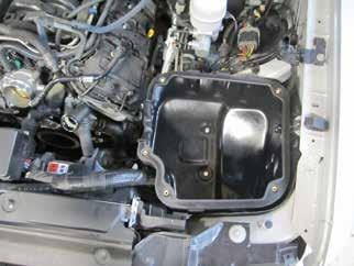h. Install the AEM lower air box and secure it to the