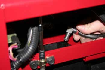 12. Siphon the fuel from the fuel tank: Note: The only way to remove fuel from the tank is with a