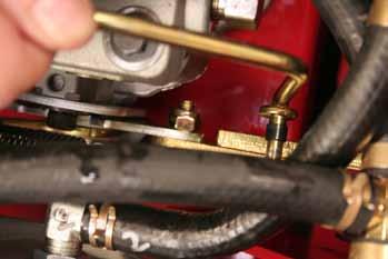 36. Serial range 290000210 and up: There are 3 rollers located on the rear end of the right hand shifter link rod inside the
