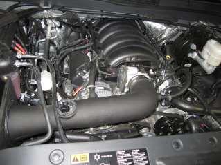 Gently place AEM air filter into the air box with supplied