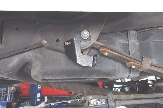 Using a 0mm wrench, 24mm wrench, and 27mm socket, remove the emergency brake