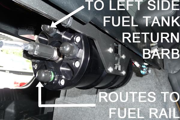 For fuel starvation efficiency, the top port should route to the main fuel tank's return barb found on the left side. The functionality of the other 2 ports on the FST is not important. 29.