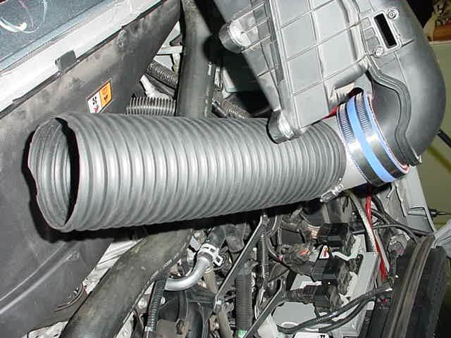 the vehicle using the 3.5 x 2.0 silicone sleeve and two #56 hose clamps. (Refer to figure#9). Step 11.