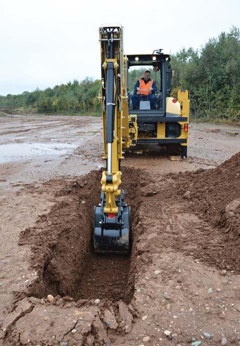 Backhoe Built for the Task Excavator Style Backhoe Whether close-up truck loading or digging over obstacles, the iconic excavator style boom tackles the toughest jobs with ease.