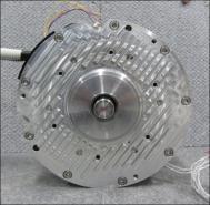 The ferrite PMs are fixed into the rotor support component with an adhesive. Fig. 8(b) shows the reduction gearbox and stator in the prototype.
