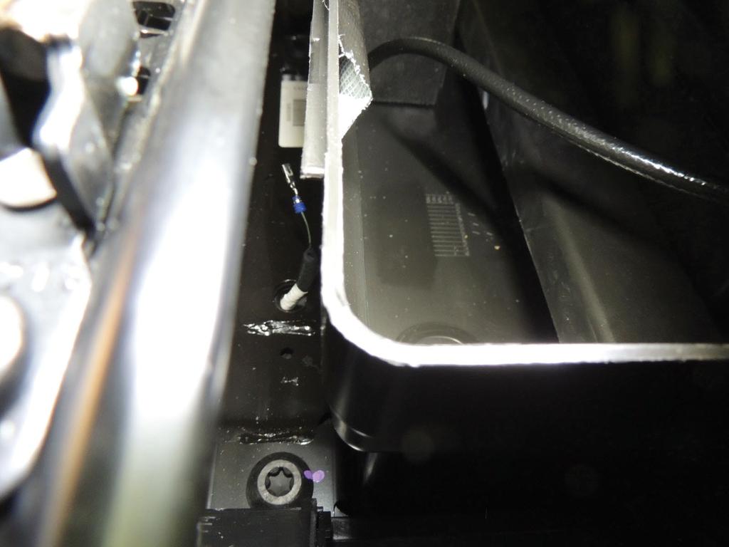 the driver seat pedestal. See Figure 15.