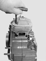 13. CYLINDER & PISTON 13.3 Remove rear manifold clamp. 13.4 Remove rear manifold from cylinder.