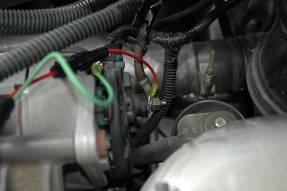 Connect the Black (-) lead to the alternator Chassis Ground connection. Connect the Red (+) lead to the alternator Hot Lead going to the battery.