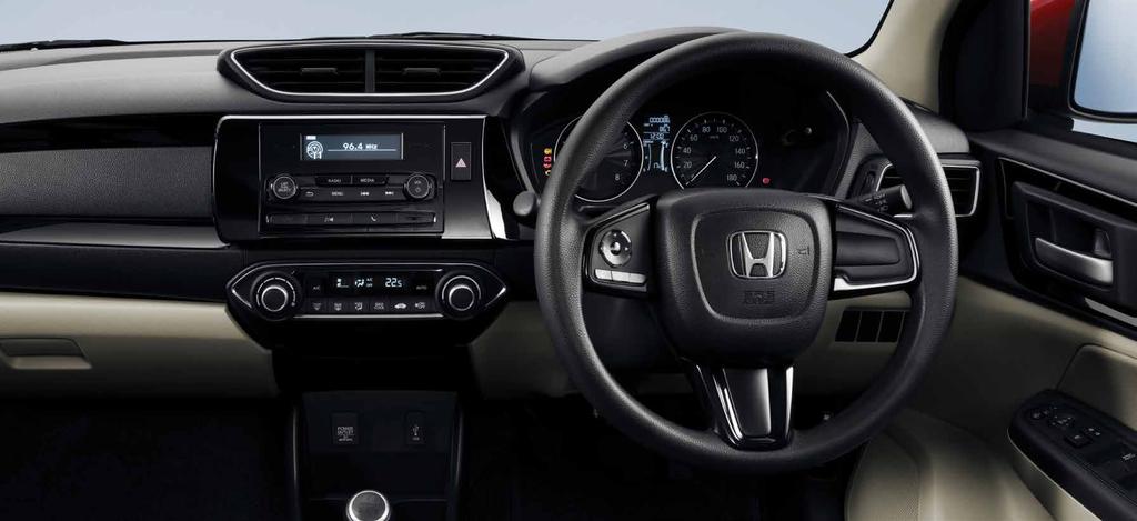 Everything is just within reach thanks to the aesthetically designed dashboard with a multifunction steering wheel, paddle shift, audio and hands-free connectivity.