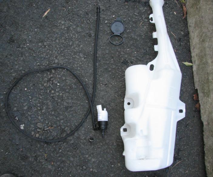 Figure 6: Factory washer bottle with components removed 11.